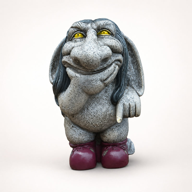 The Mischief Keeper Gargoyle grinning, hand on chin, wearing boots