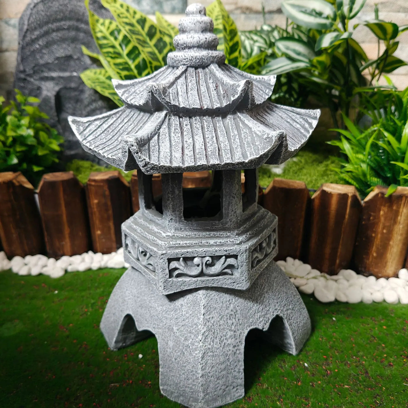 The Temple Lantern with two tiered roofs among greenery