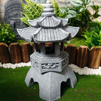 The Temple Lantern with two tiered roofs among greenery